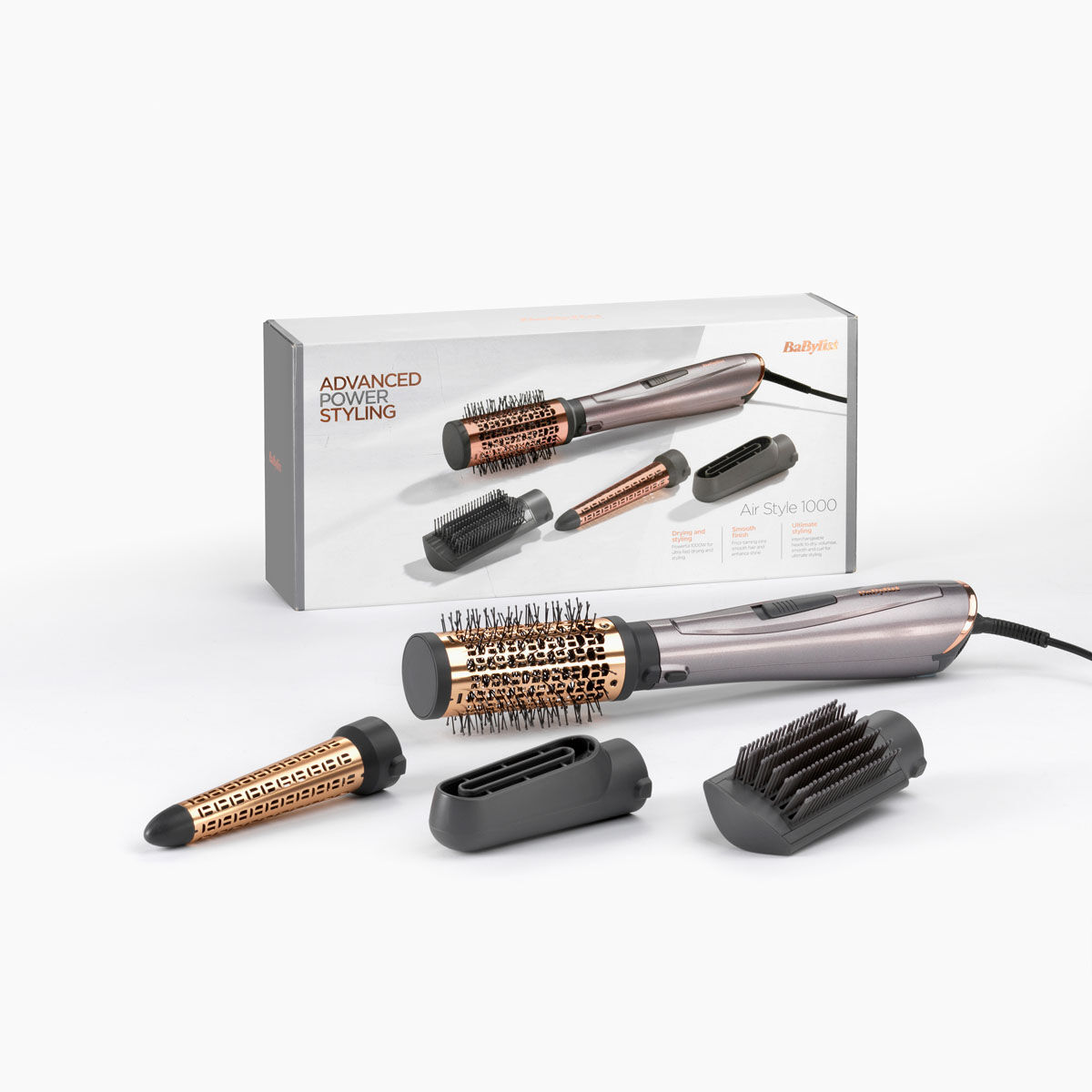 Air Style 1000, 4 styling heads (50mm thermal brush, paddle brush, drying nozzle, curling attachment) and packaging